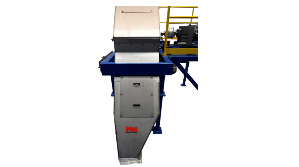 Cross-Belt Sampler (CBS) machine extracting material sample from conveyor belt in an industrial setting